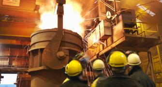 Workers in front of Blast Furnace